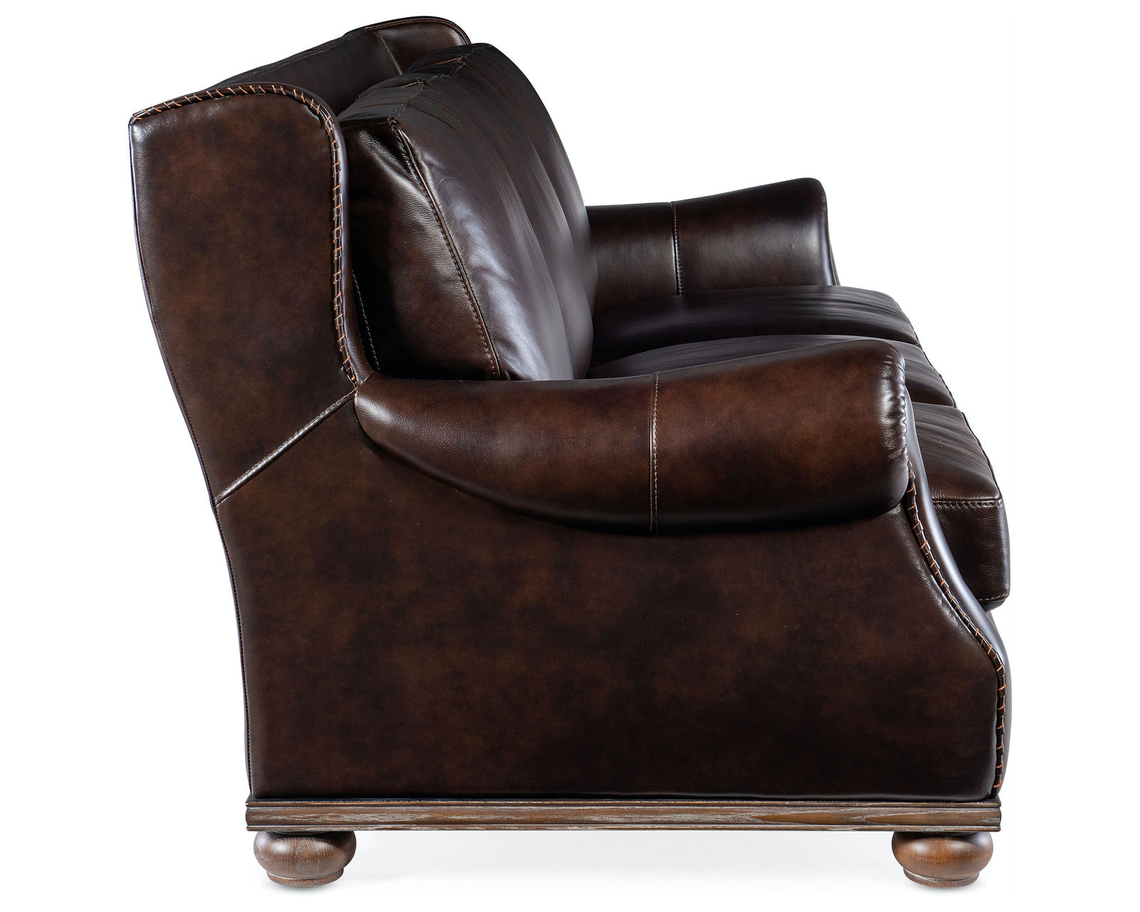 William 96" Leather Sofa (Umber Leather) - William Stationary Sofa has loose seat cushions, a modified wing back