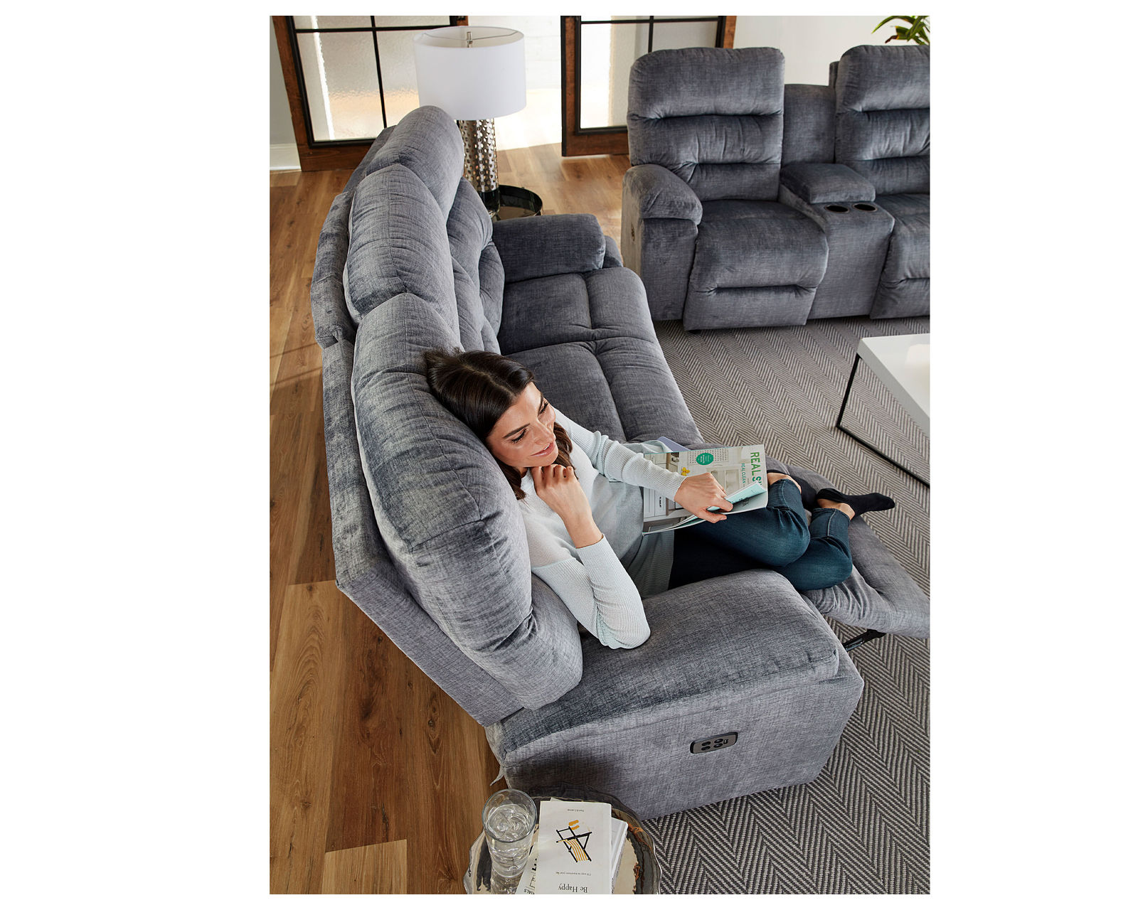 Ryson Double Reclining Console Loveseat (+100 fabrics) - Slightly curved for more conversational setting for friends and family.